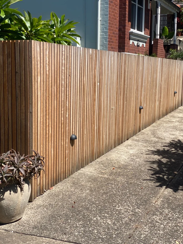Timber slat gate and garden boundary